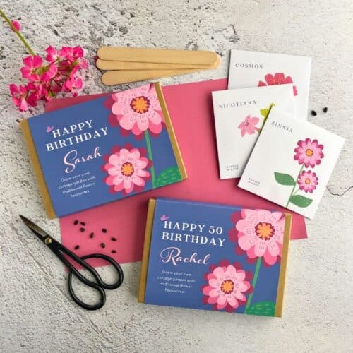 two flower seed gift boxes and seed packets