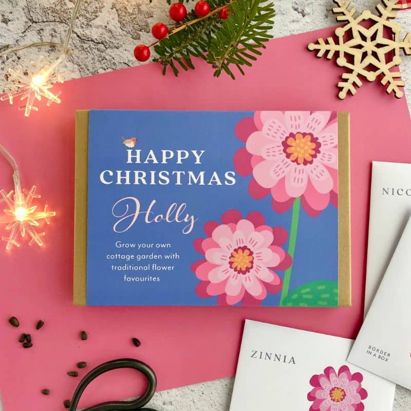 happy christmas flower seed gift box 800 x 800 flower seed gift box with Happy Christmas text and zinnia flower illustration