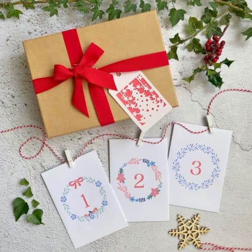 advent calendar gardener botanical gift box. kraft gift box red ribbon christmas advent envelopes