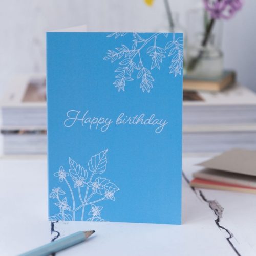 Happy Birthday card blue background white writing