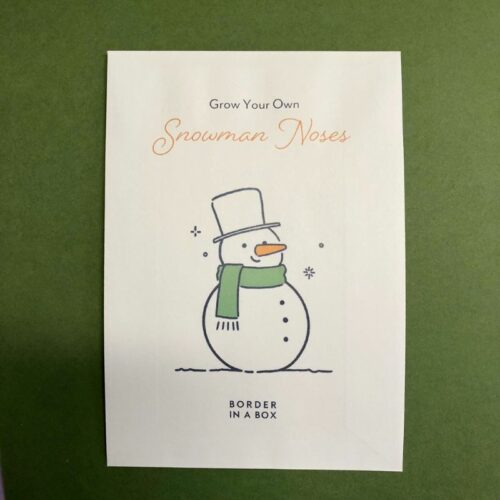 white envelope with snowman illustration