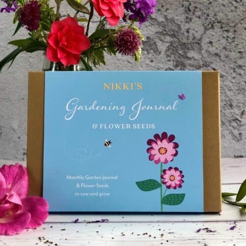 personalised gift box containing garden journal and flower seeds