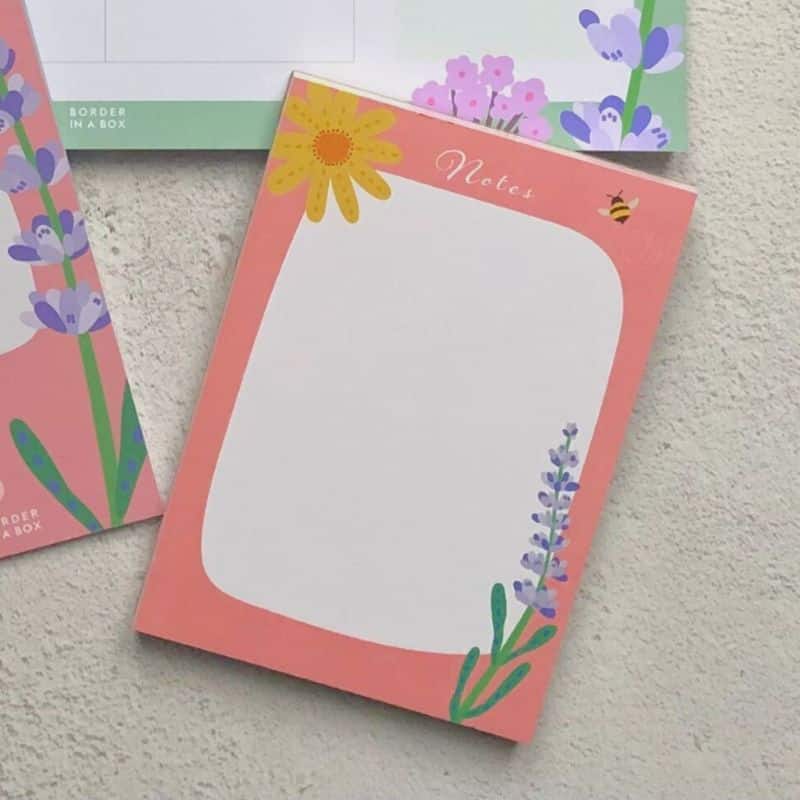 notepad A6 size flower illustrations with a pink border