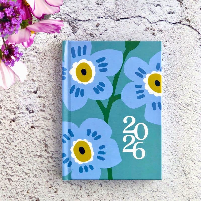 diary 2026 front cover with blue forget me not flower illustration